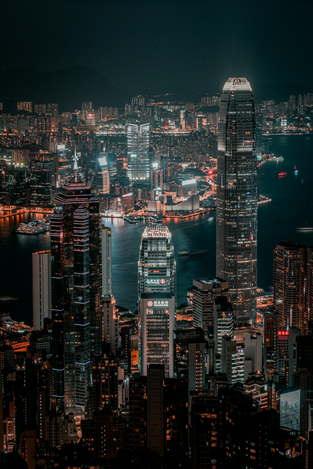 a view of a city at night from the top of a building