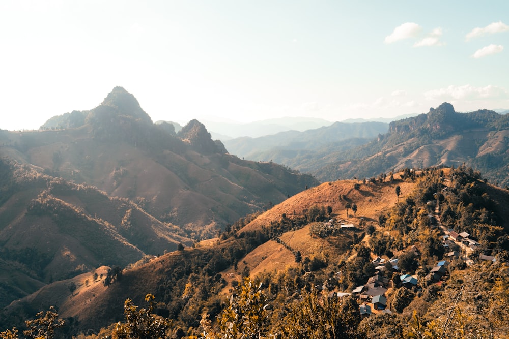 a view of a mountain range with houses on it