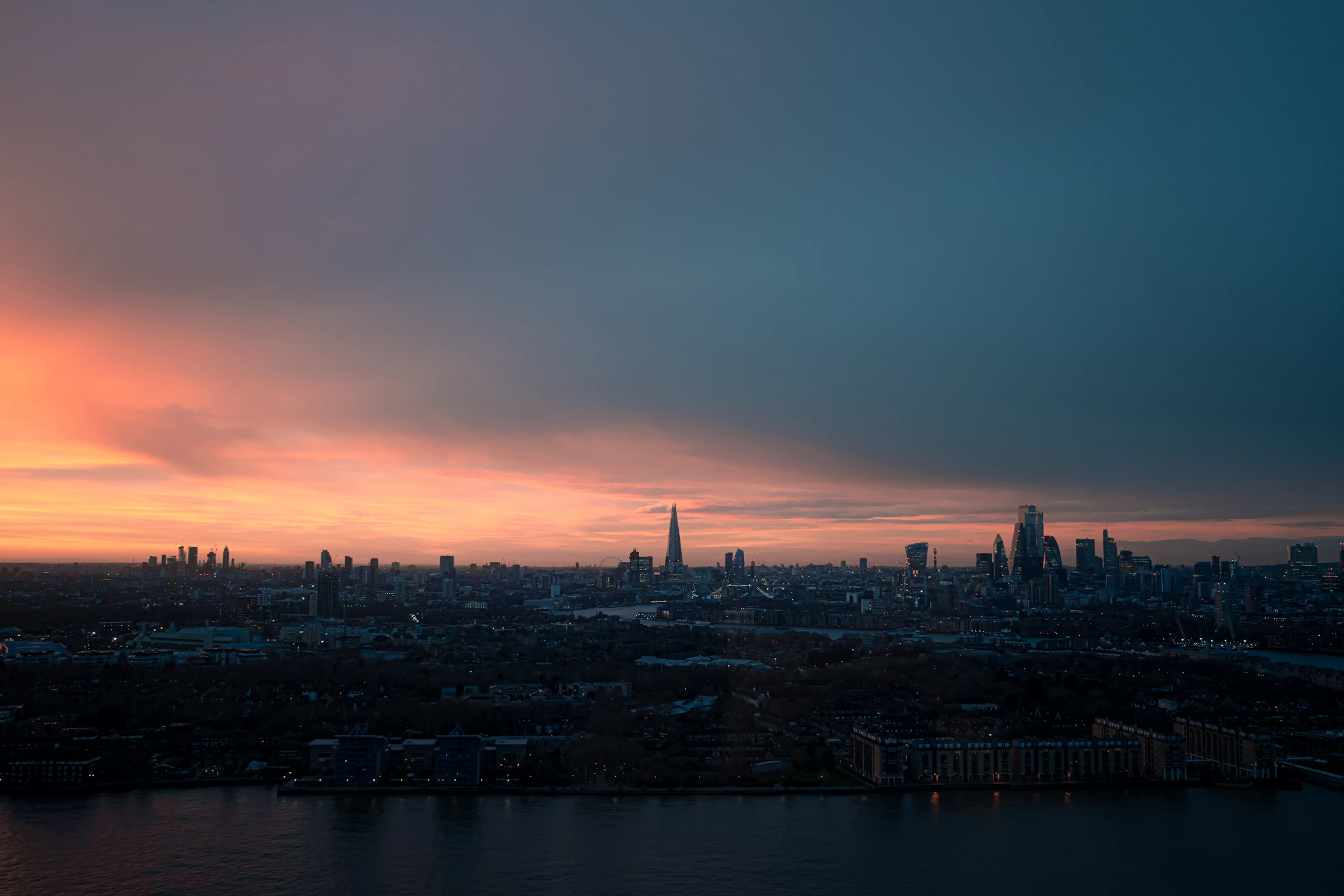 The London skyline at dusk, the Shard against a red sky