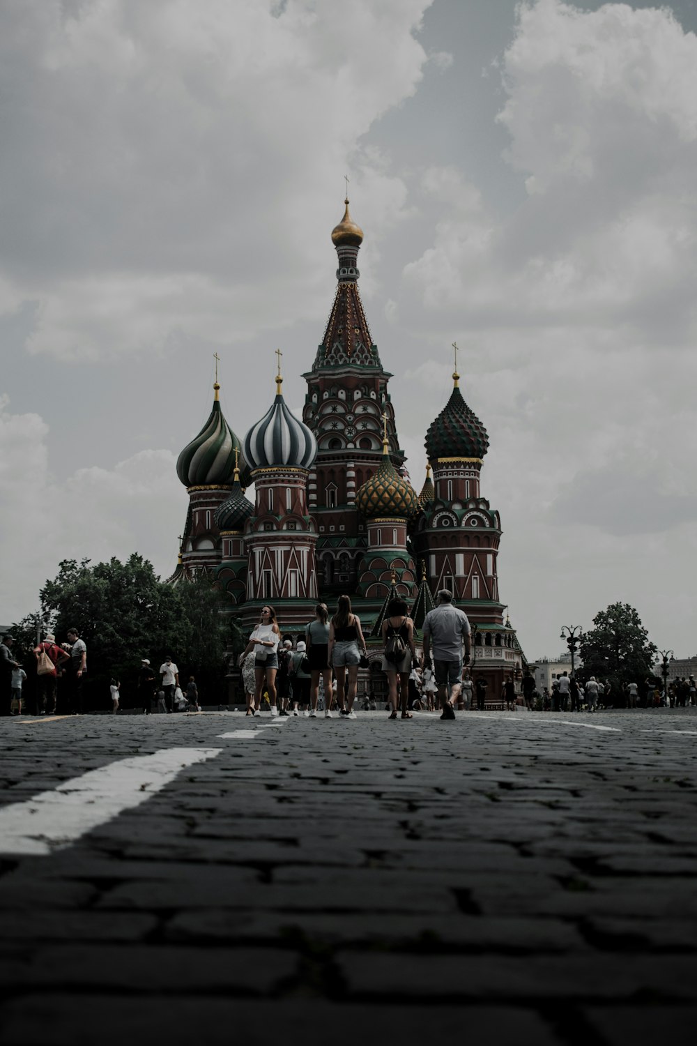 a group of people standing in front of a building