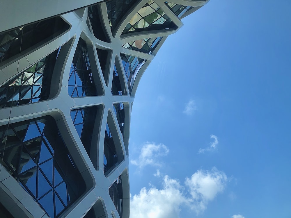 a very tall building with a sky in the background