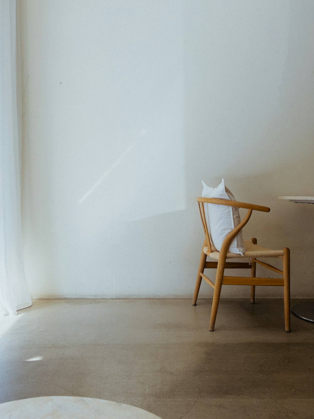 a chair and a table in a room