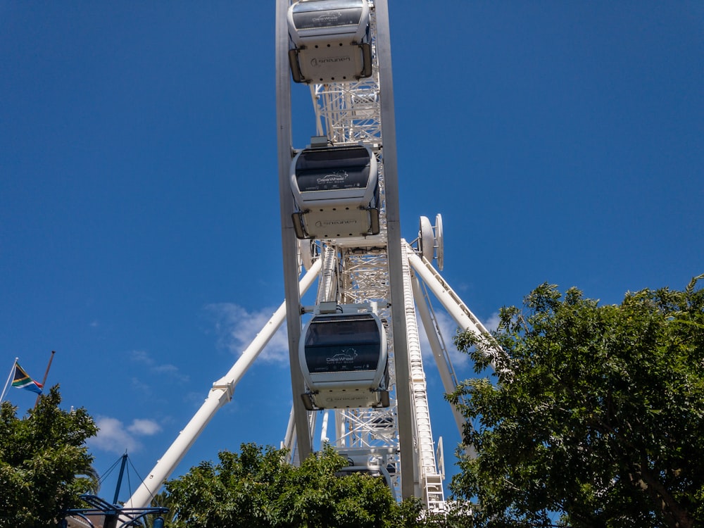 a ferris wheel with a blue sky in the background