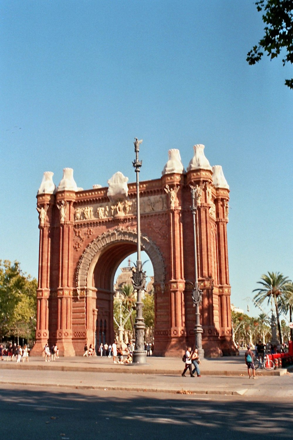 a large arch with a clock on top of it