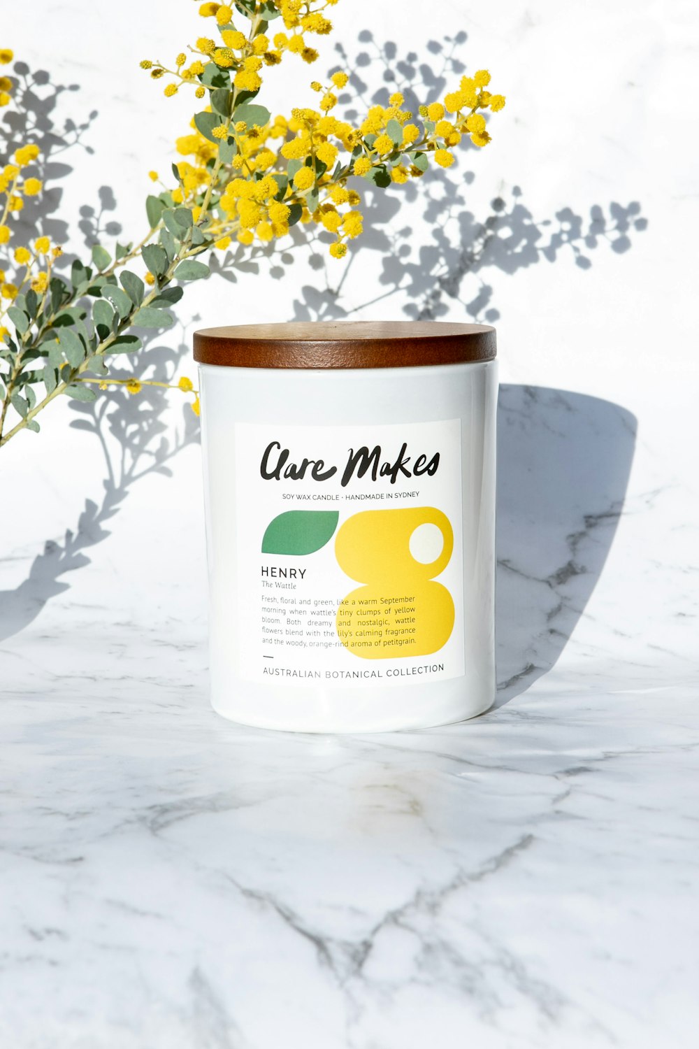 a can of pure mixes sits next to some yellow flowers
