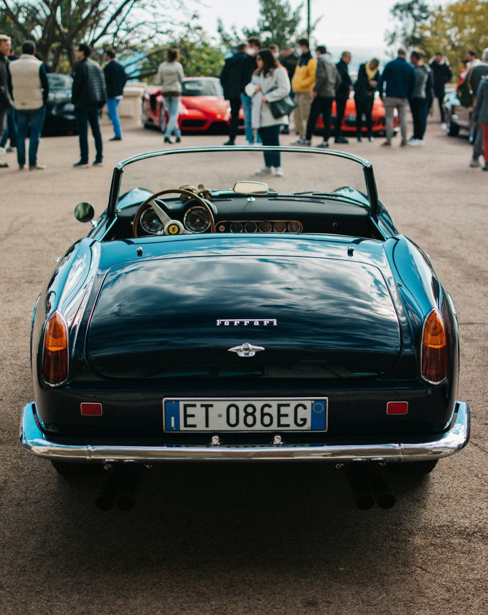 A blue sports car parked in a parking lot photo – Free California Image on  Unsplash