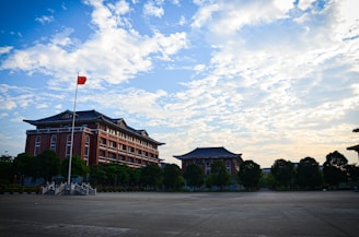 a large building with a flag on top of it