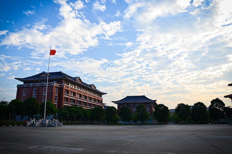 a large building with a flag on top of it