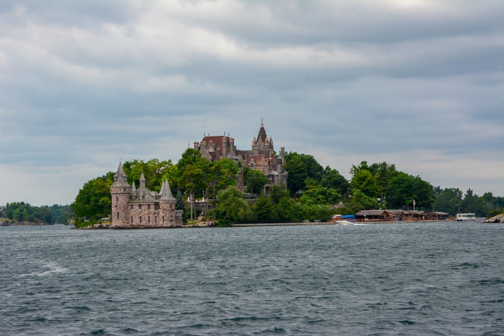 a castle on an island in the middle of a lake