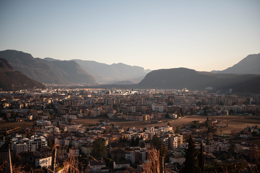 a view of a city with mountains in the background