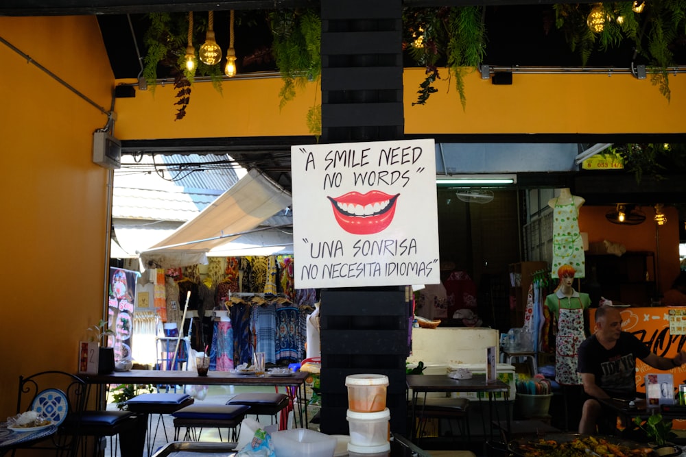 a sign that says a smile need no words