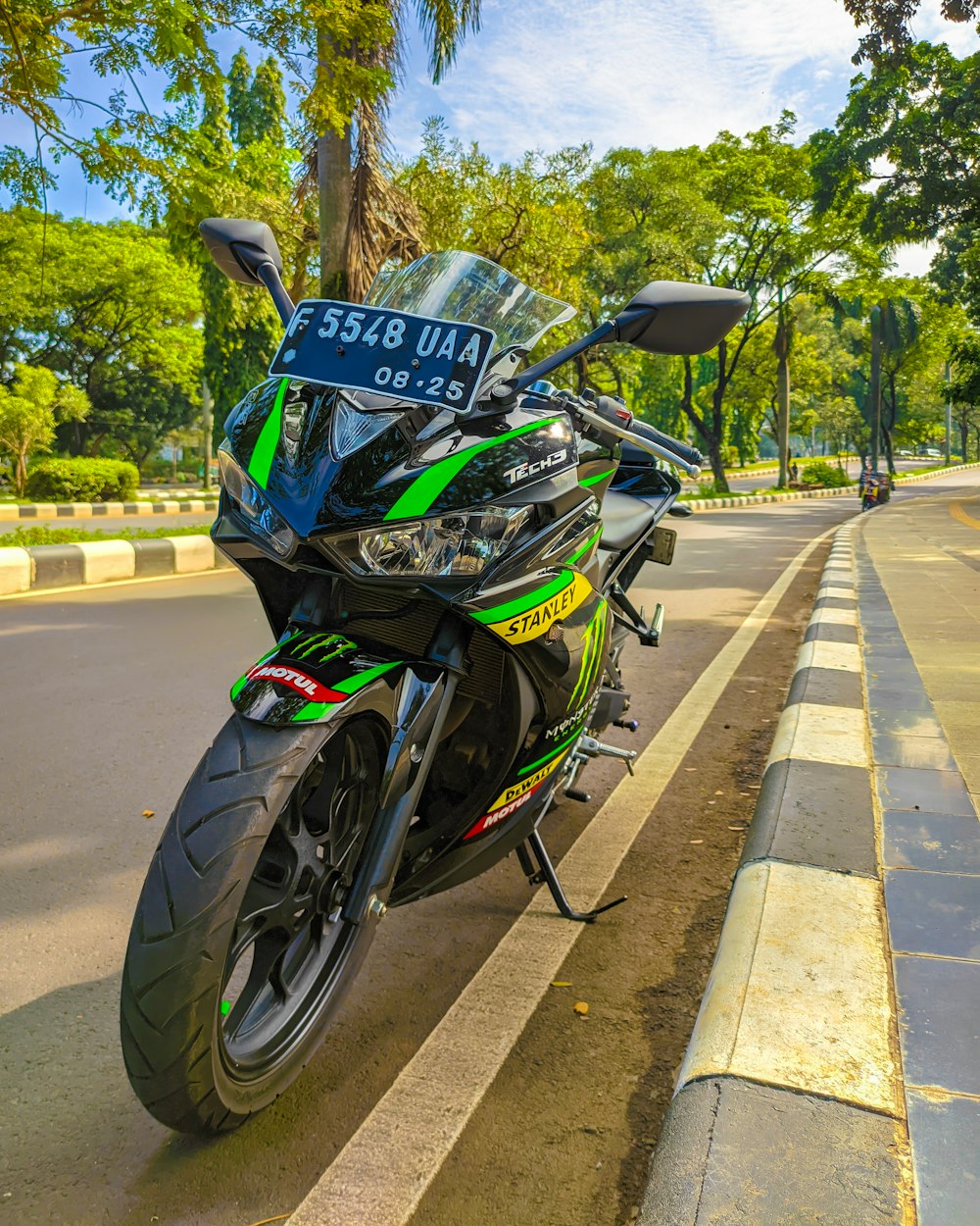 a motorcycle parked on the side of the road