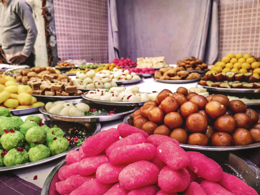 A spread of Indian sweets including jalebi