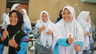 a group of young women standing next to each other
