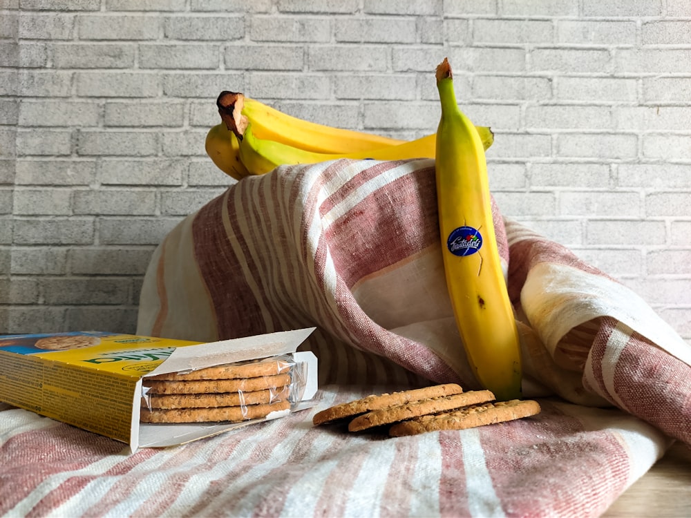 a towel with a bunch of bananas on top of it