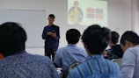 a man standing in front of a group of people