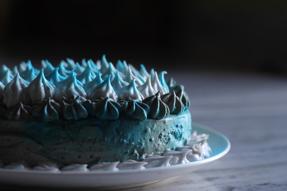 a close up of a cake on a plate on a table