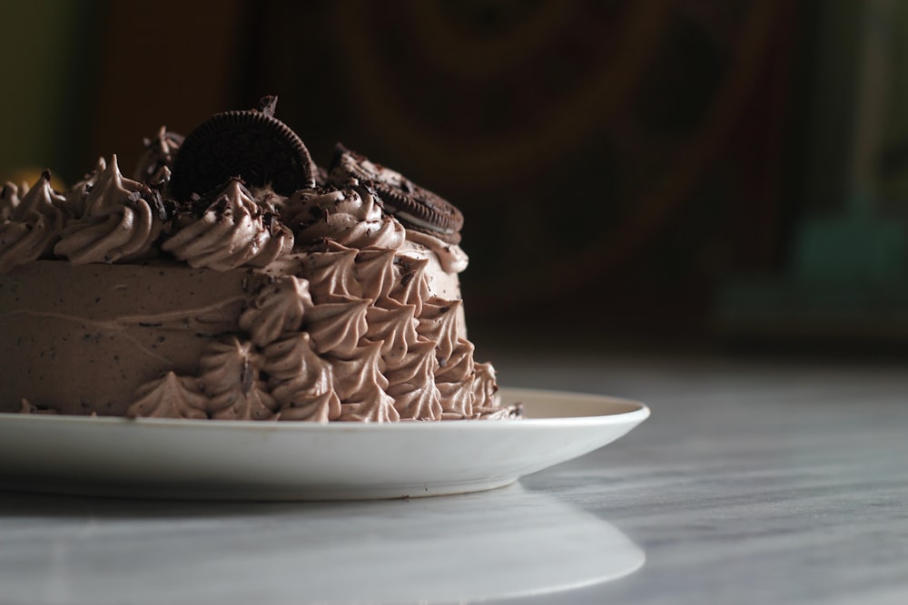 a close up of a cake on a plate on a table