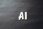 the word ai spelled in white letters on a black surface by Markus Spiske (@markusspiske)