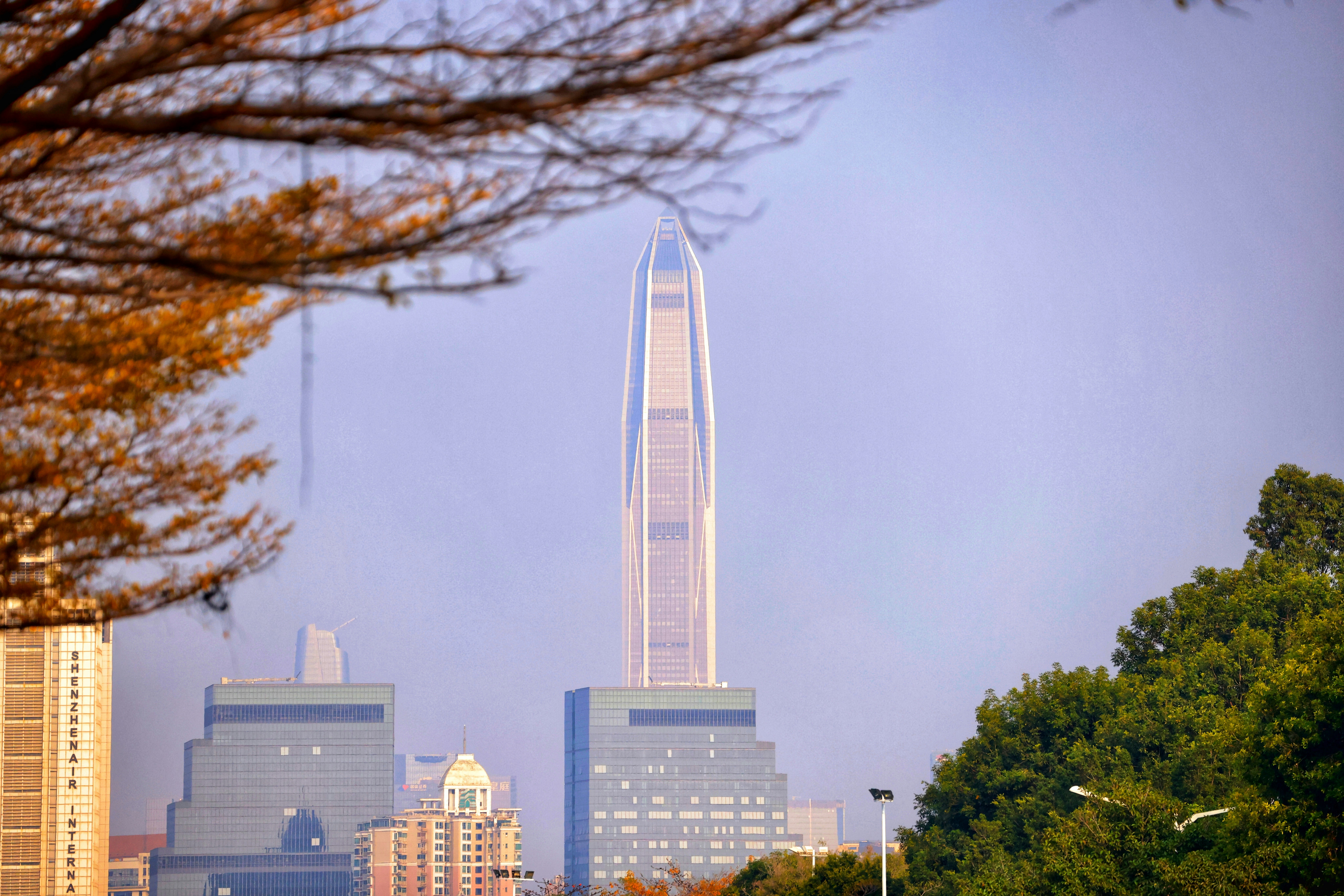 A view of a city with tall buildings photo – Free Blue Image on Unsplash