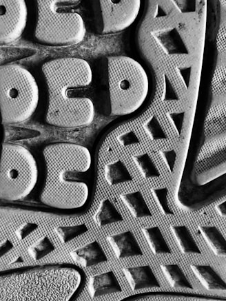 Close-up of a knee pad with shock-absorbing gel and textured anti-slip surface.