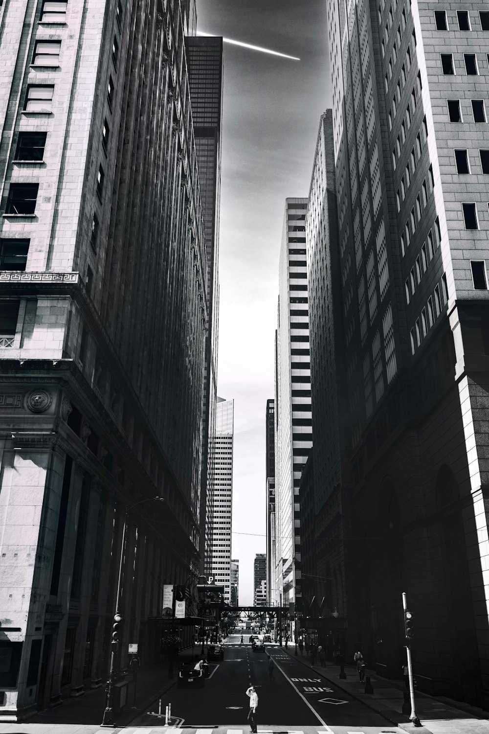 a black and white photo of a city street