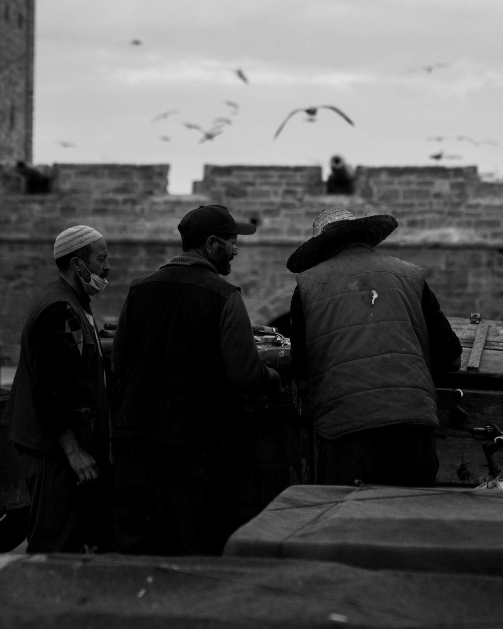 a group of men standing next to each other