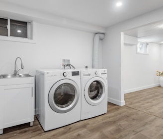 a laundry room with a washer and dryer