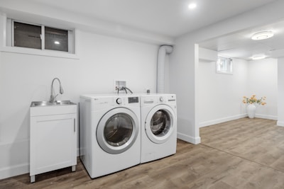 a laundry room with a washer and dryer