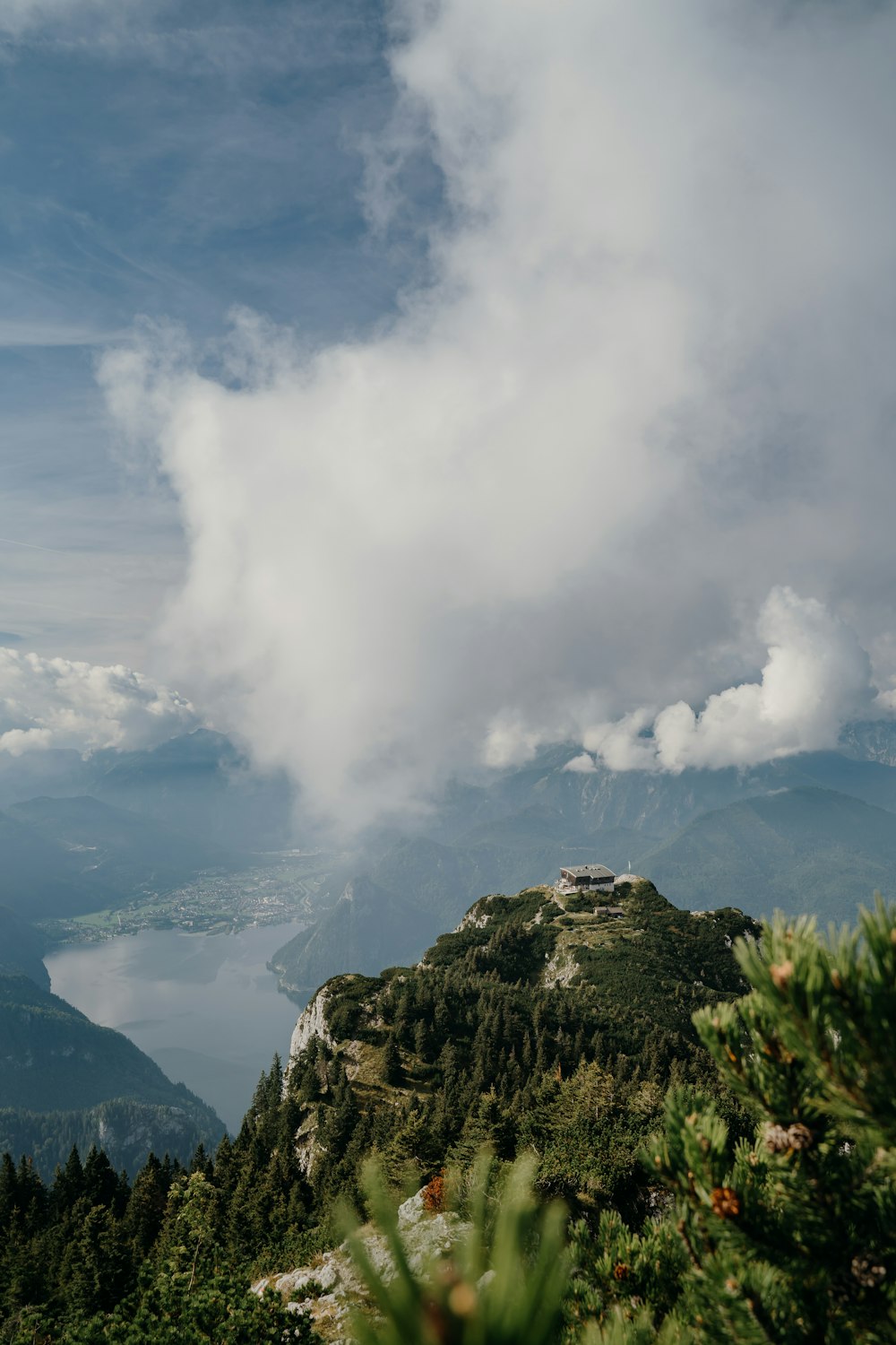 a view of a mountain with a body of water in the distance