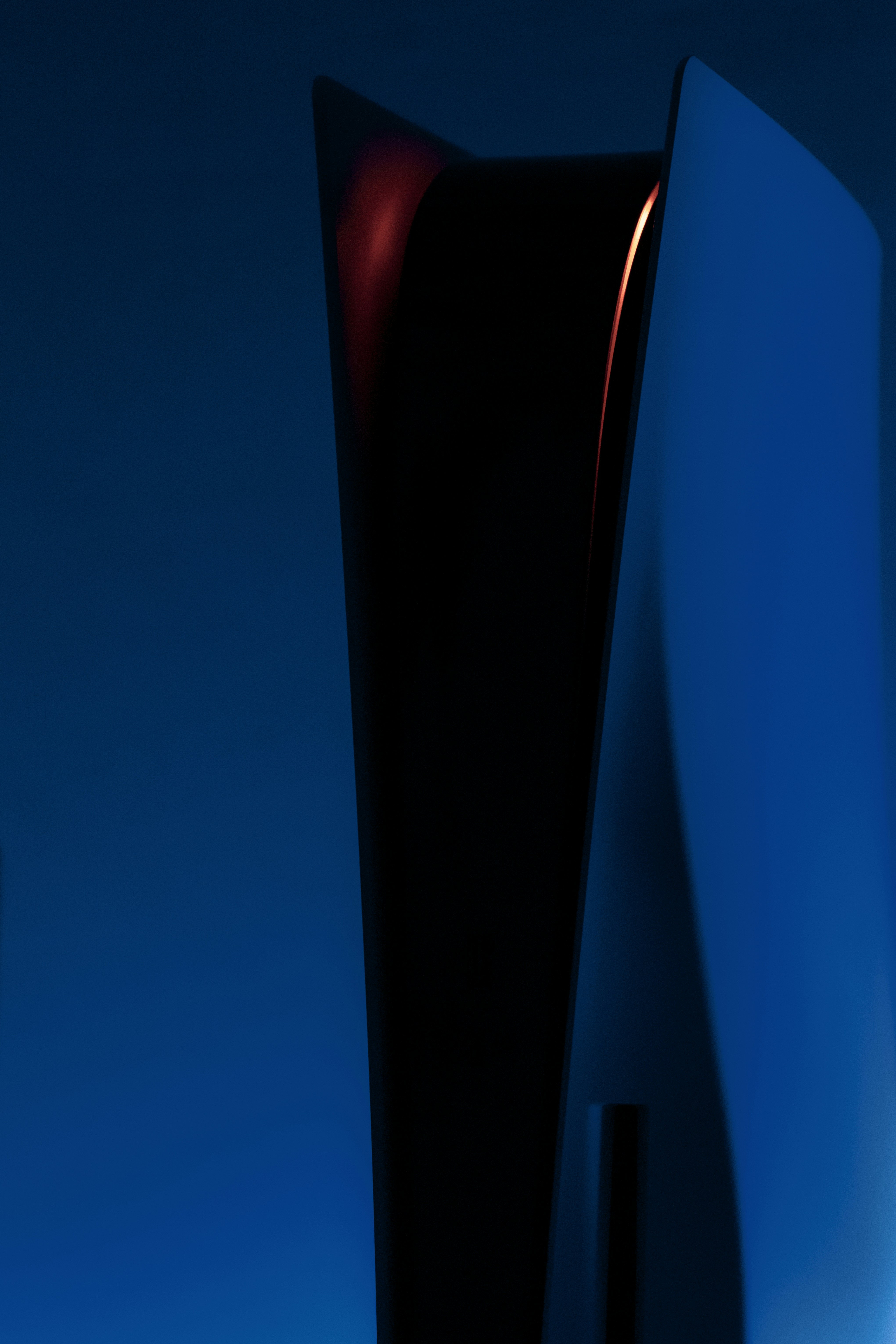 a very tall building with a blue sky in the background