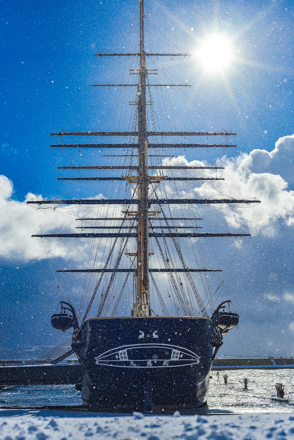 a large boat sitting on top of a body of water