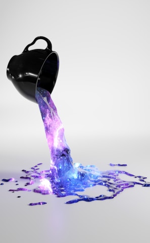 a purple and blue liquid pouring out of a black container
