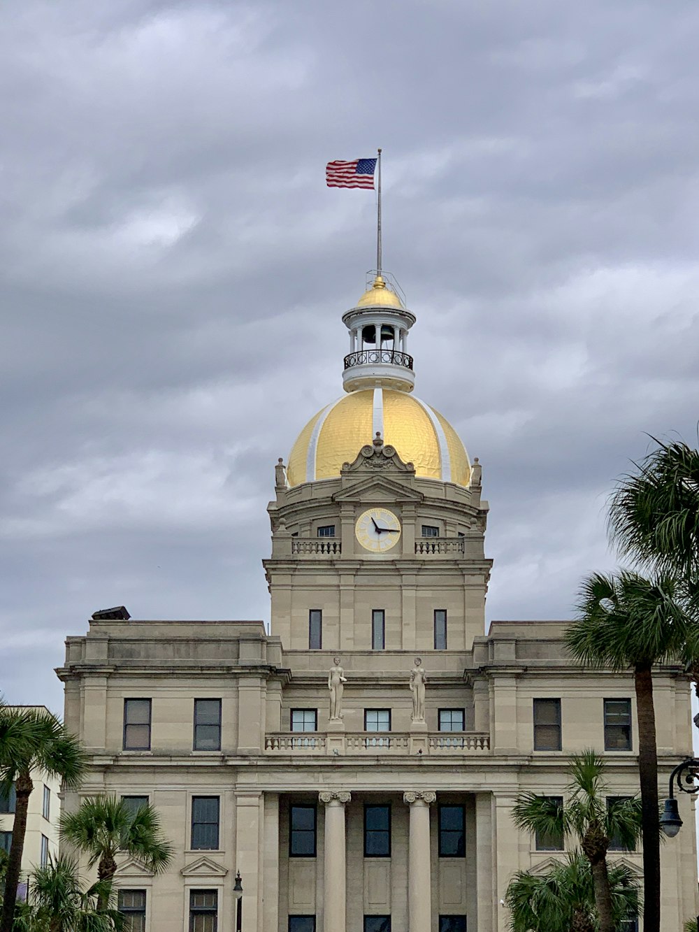 a large building with a flag on top of it