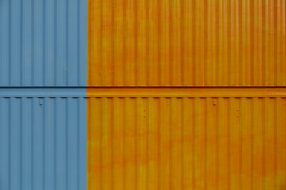 a close up of a yellow and blue wall