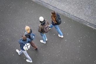 a group of people walking down a street