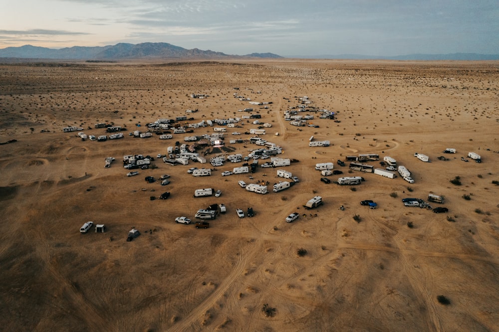 a lot of cars in the middle of a desert