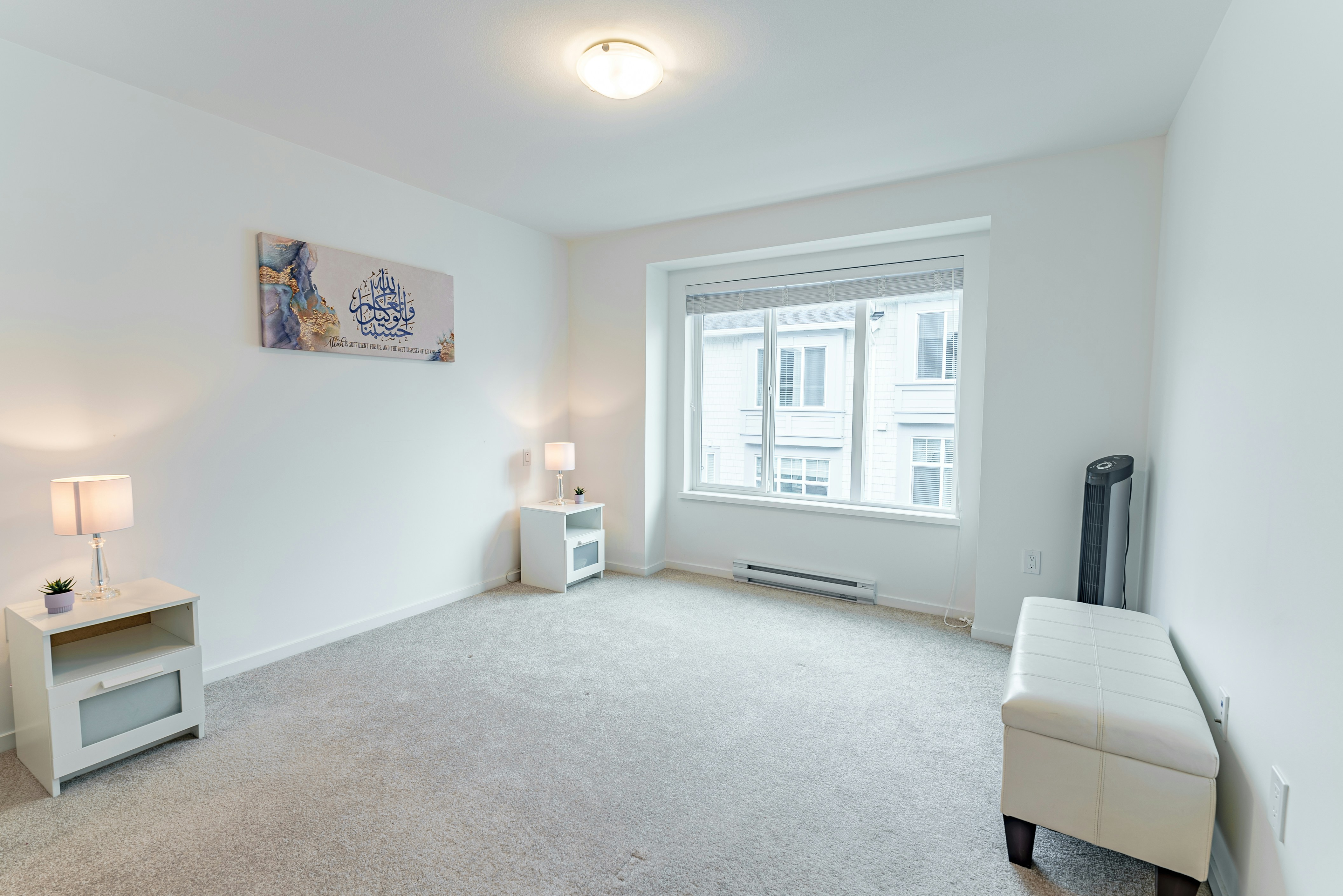 peaceful bedroom in a British Columbia home during a cool spring night - ideal thermostat temperature for sleeping