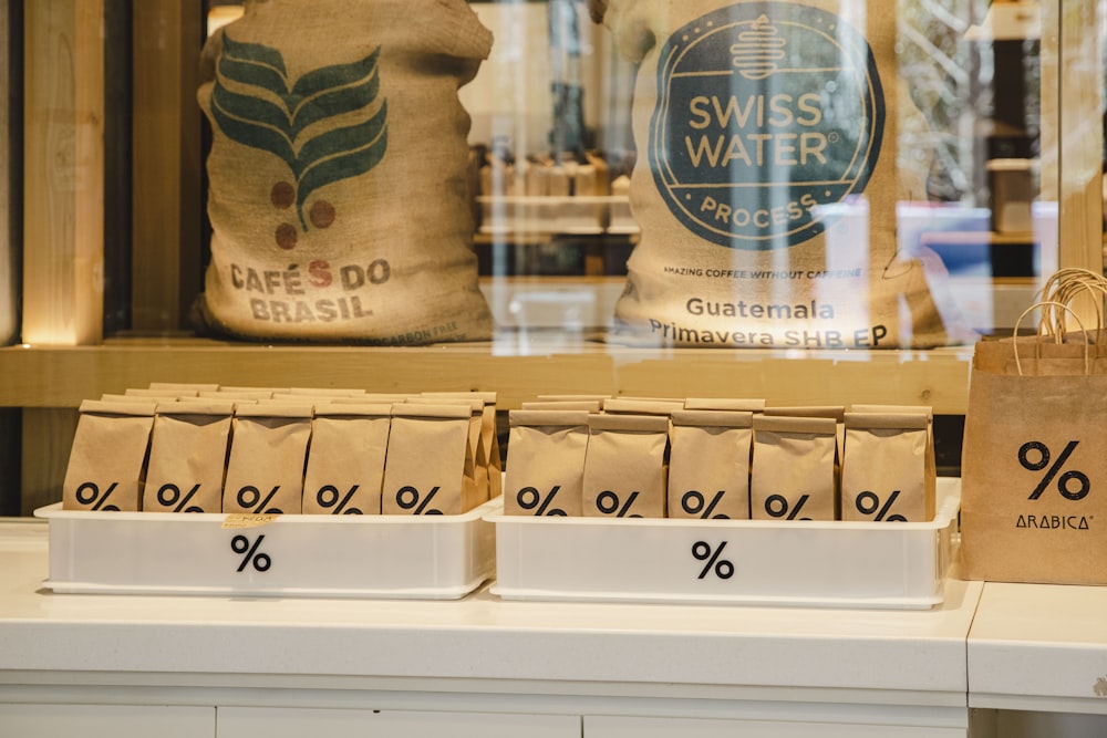 a store window with bags of coffee on display