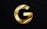 a gold letter g on a black background