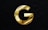 a gold letter g on a black background
