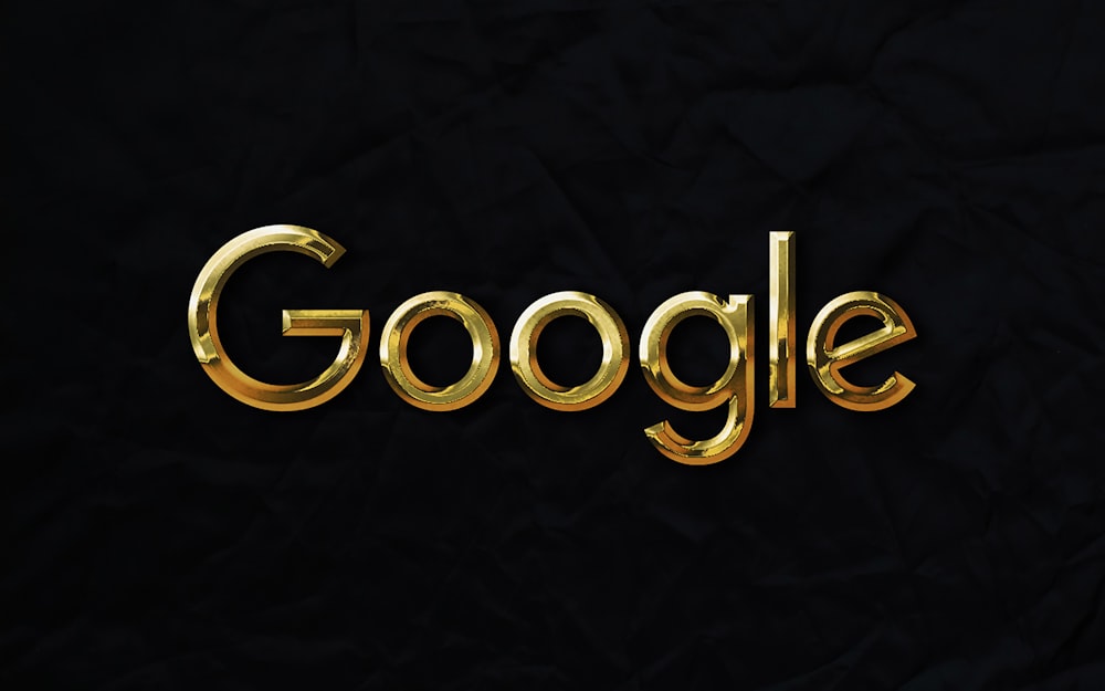 a gold google logo on a black background