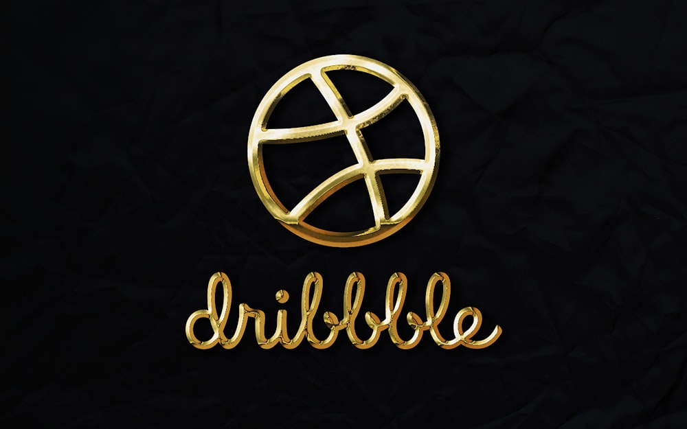 a gold logo on a black background