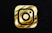 a gold instagram logo on a black background