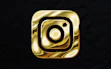 a gold instagram logo on a black background