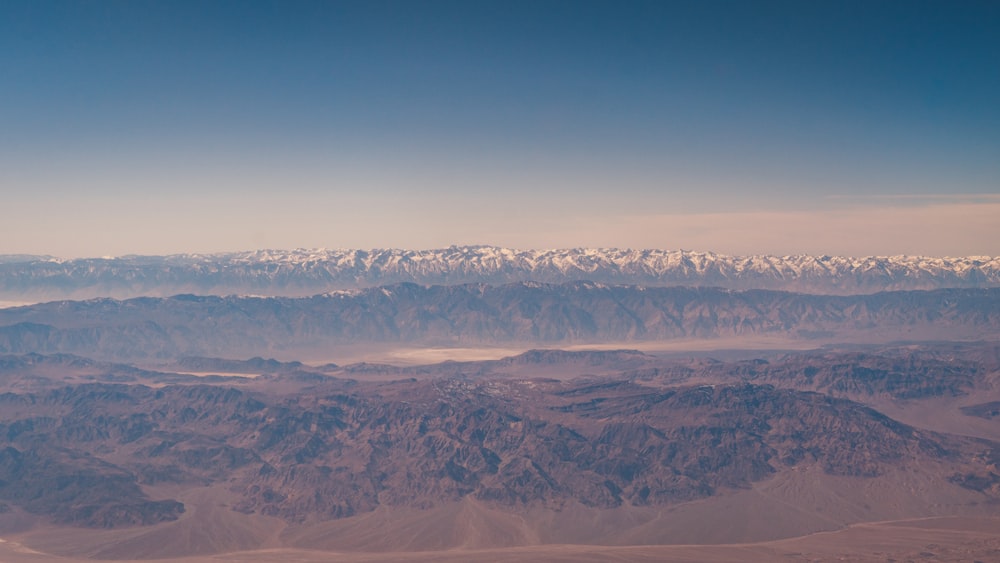 a view of a mountain range from an airplane