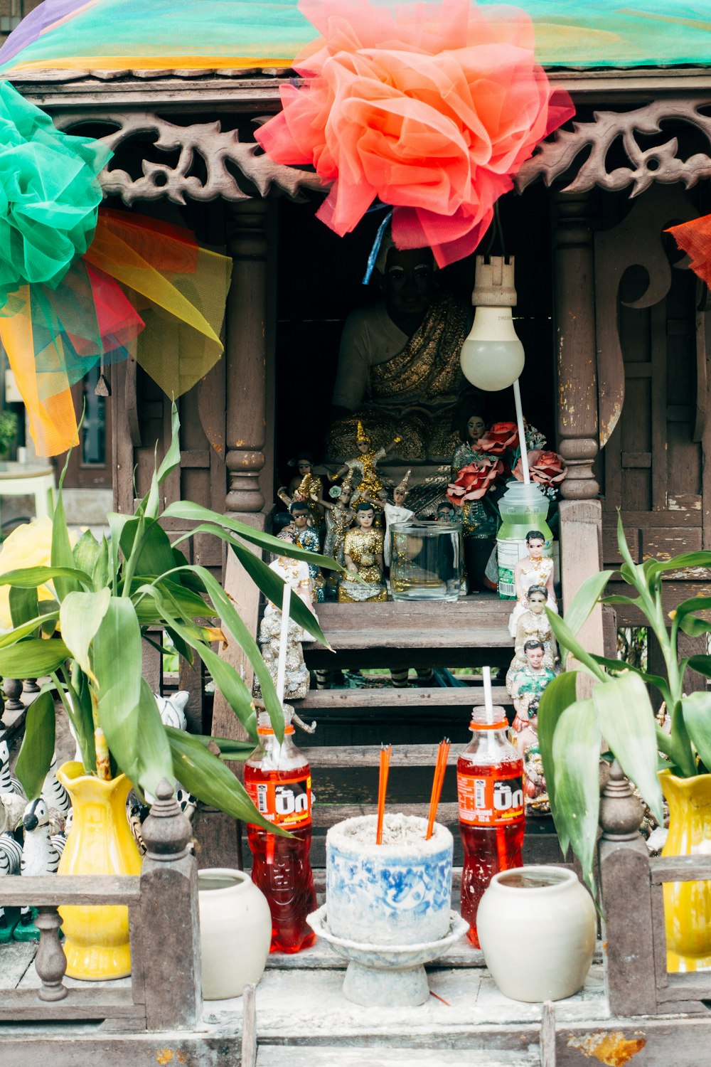 a decorated shrine with candles and decorations