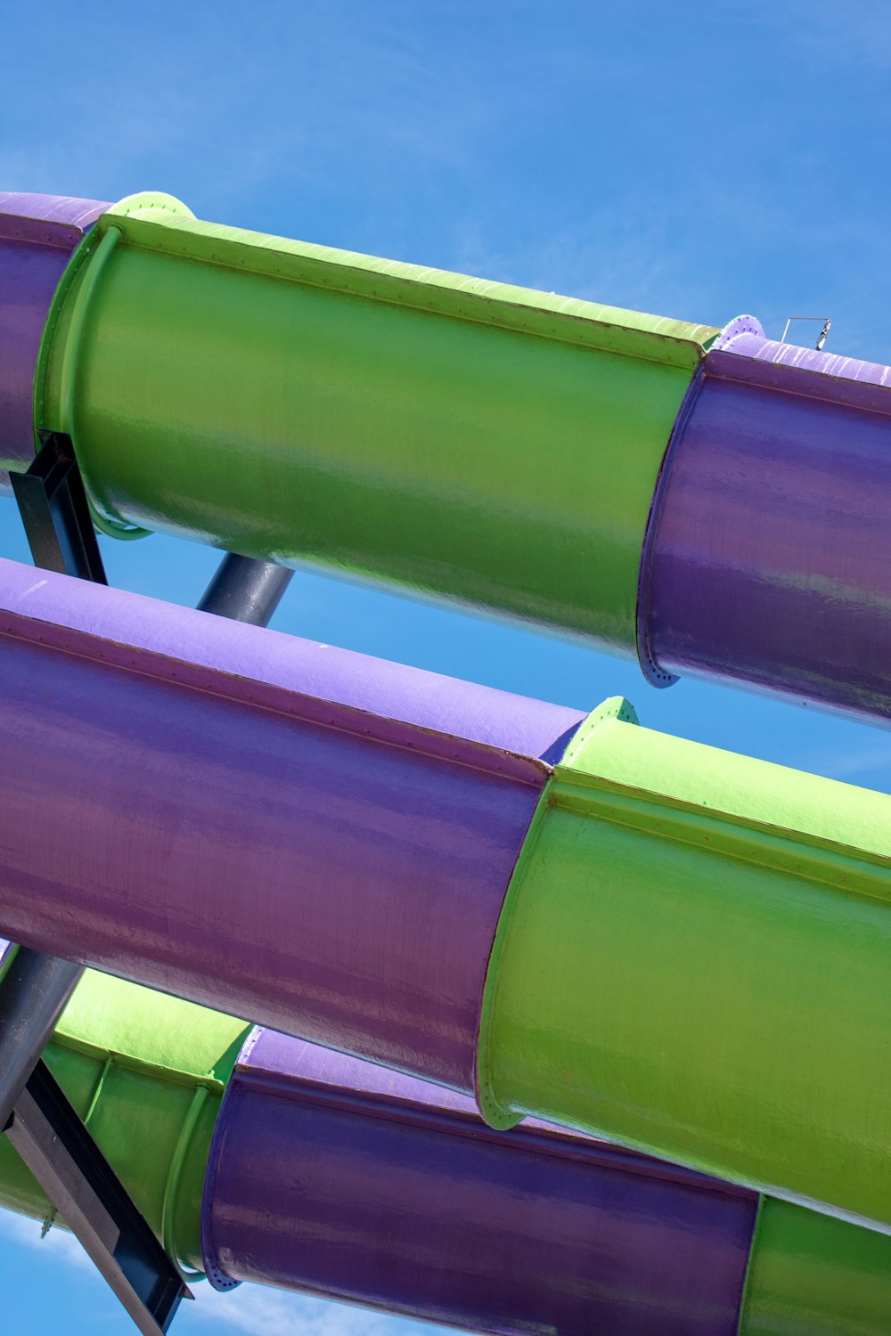 a close up of a colorfully painted water slide