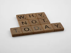 a scrabble of scrabble tiles that say why not today