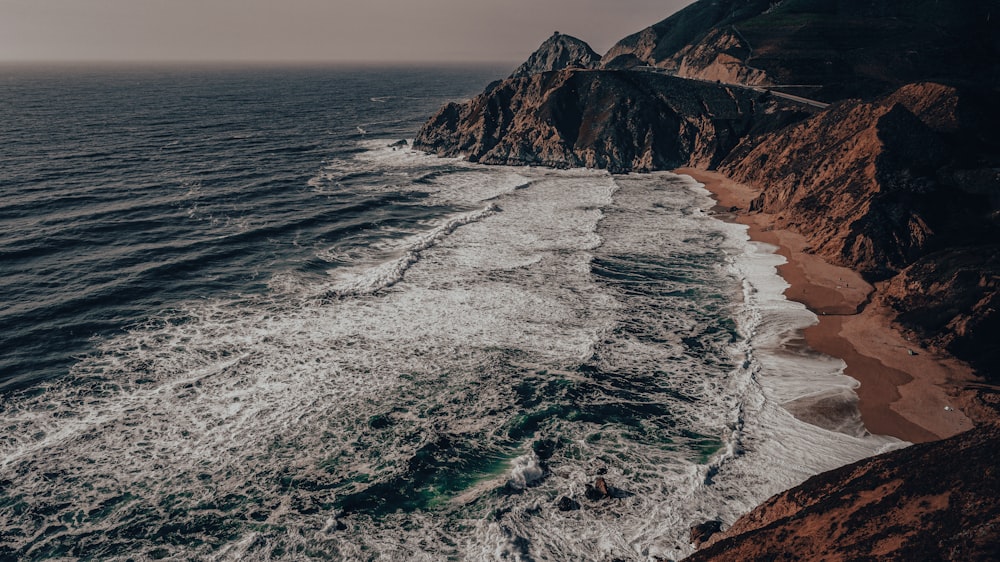 a view of the ocean from the top of a mountain